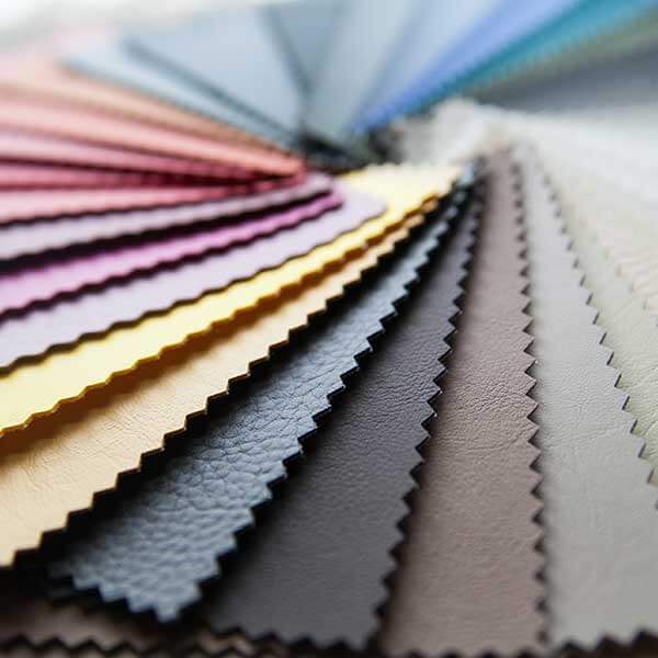 Color swatches fanned out with varying surface textures and colors.