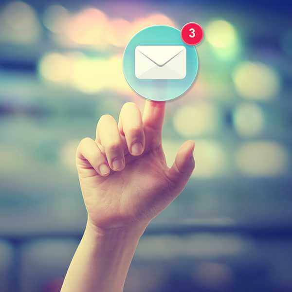 A hand reaching up and clicking on their mail icon showing three messages.